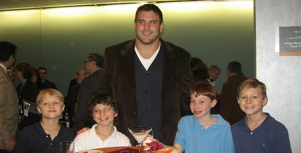 Todd Herremans with children at event