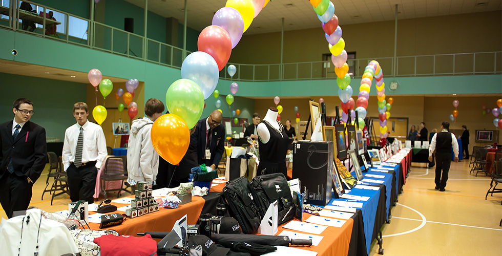 Balloon arches and silent auction