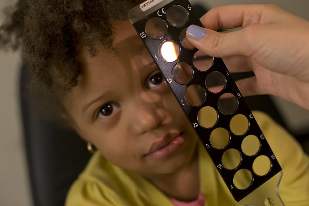 Young girl getting an eye exam