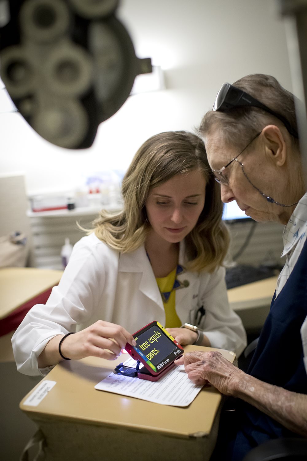 Dr. Kenny working with a low vision patient