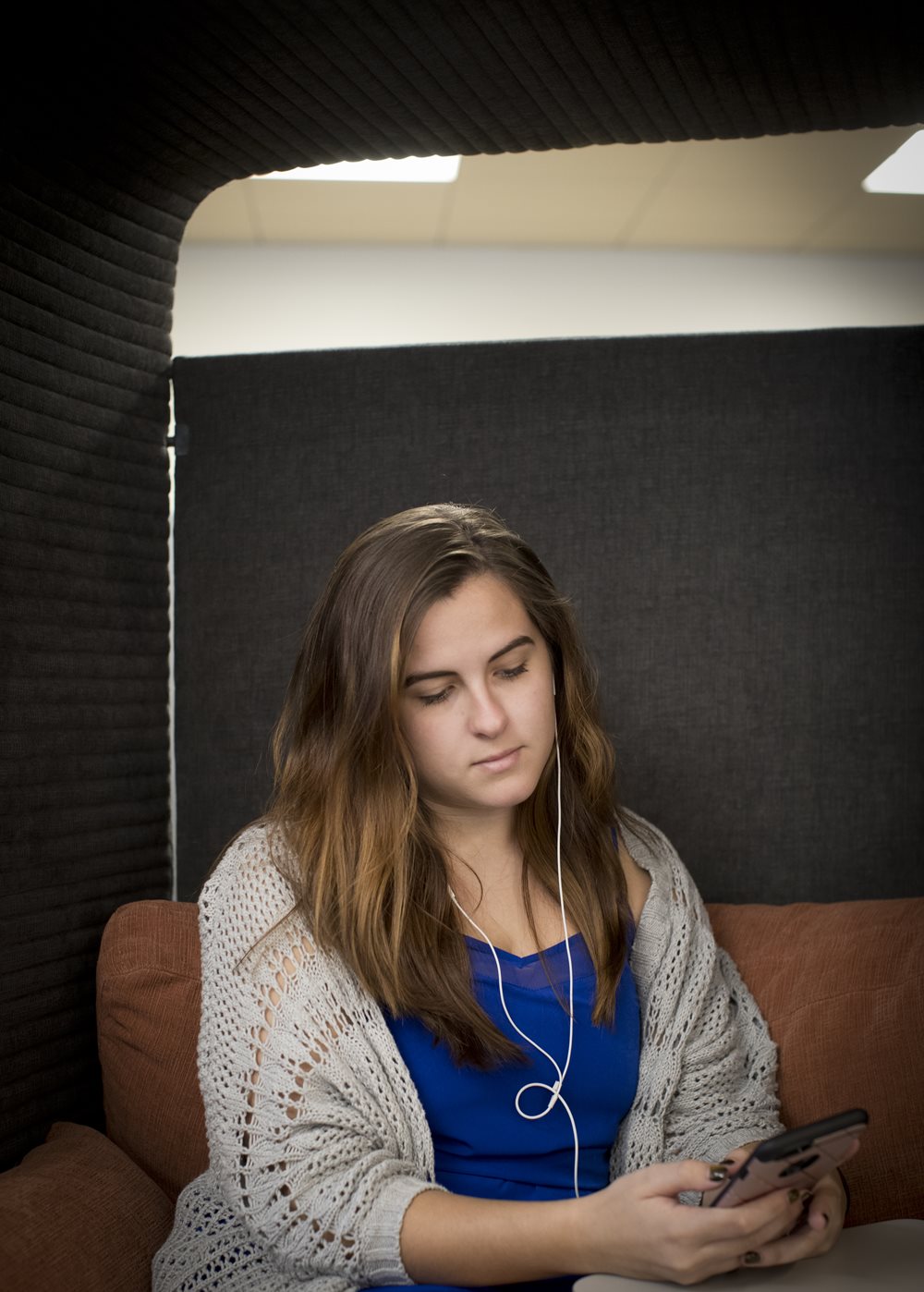 girl listening to headphones