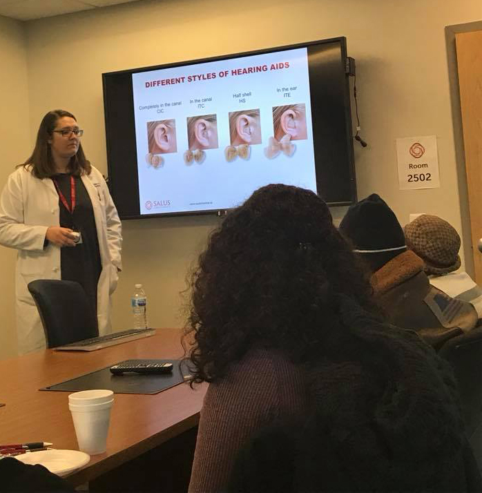 PEI doctor giving presentation on hearing aids