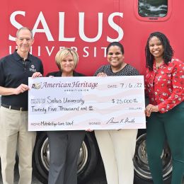 American Heritage check presentation to Salus