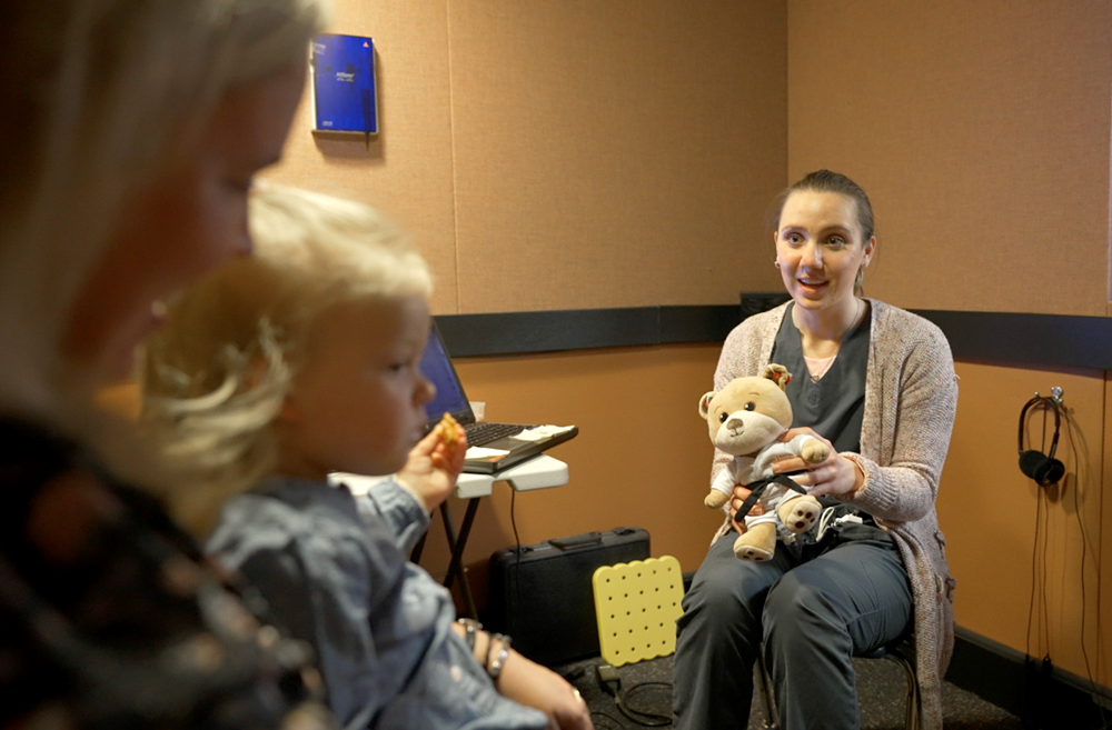 toddler having hearing test