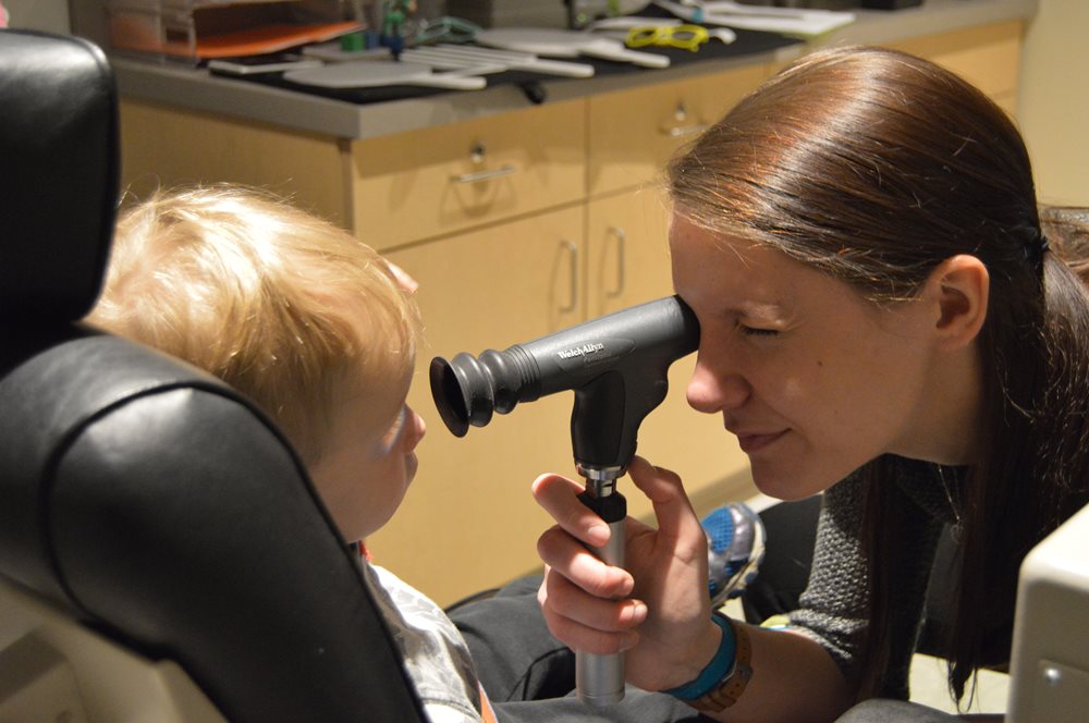 Pediatric boy having an eye exam