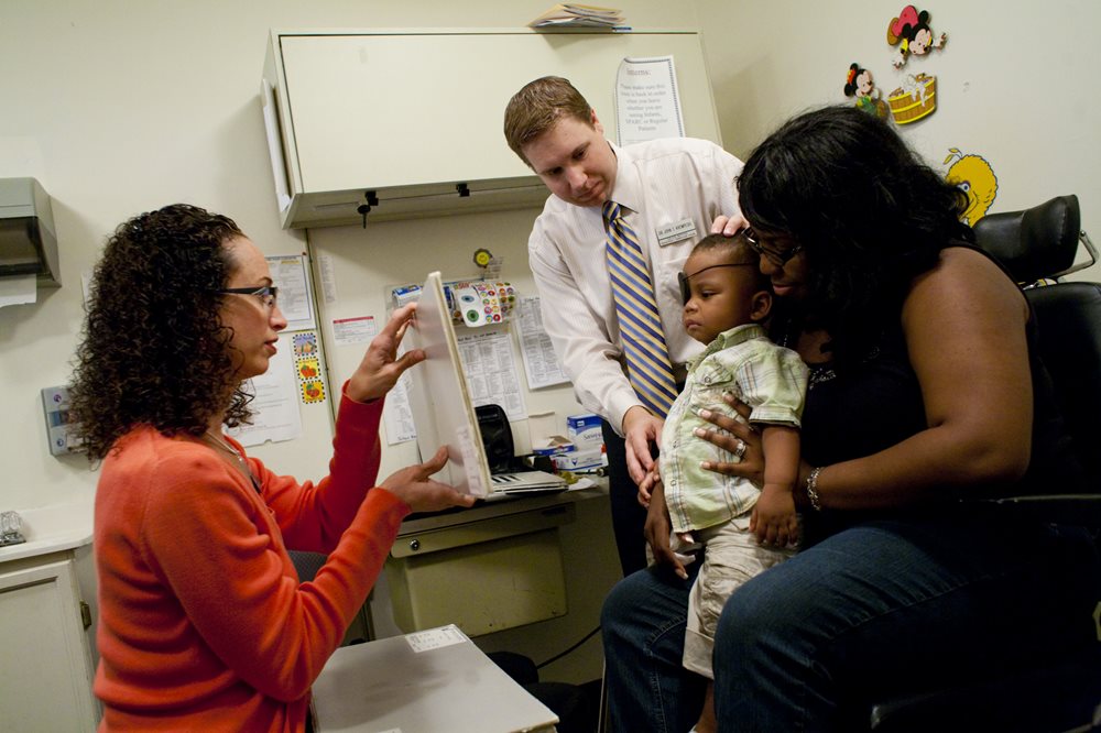 Baby boy getting an eye exam