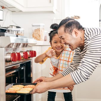 Dad Baking with daughter