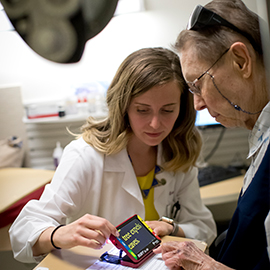 Dr. Erin Kenny working with a patient