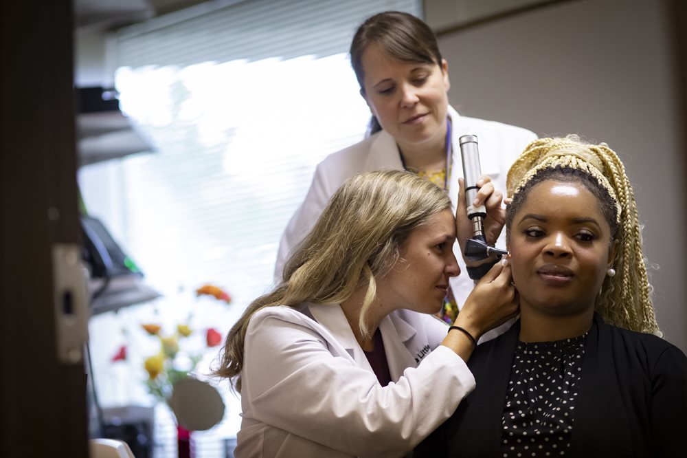 Woman having a hearing exam