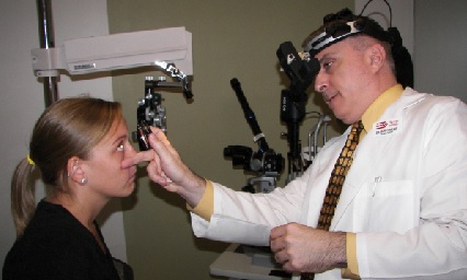 Carlo Pelino working with a patient