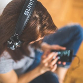 girl wearing headphones