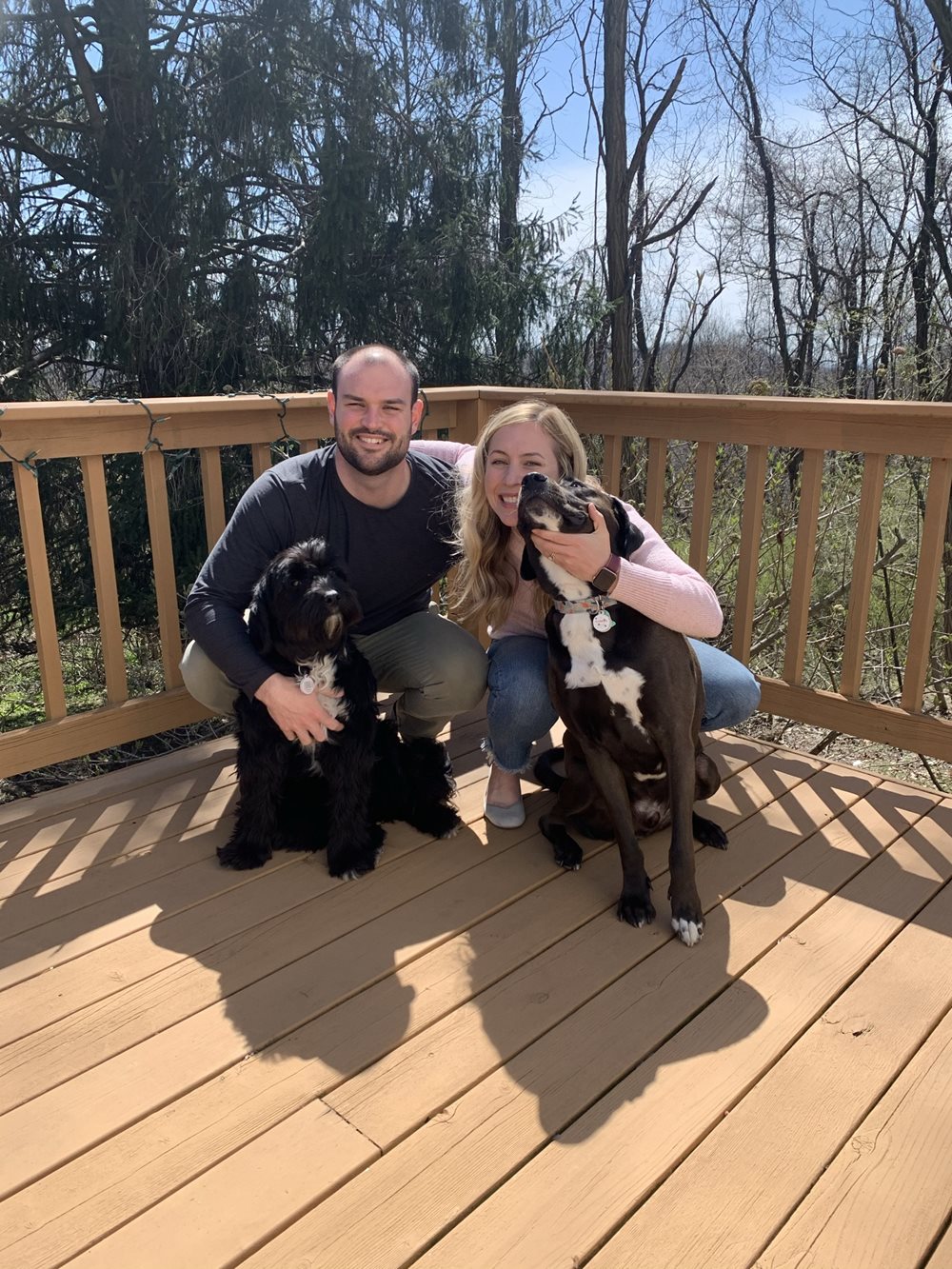 Dr. DeMoss with husband and dogs