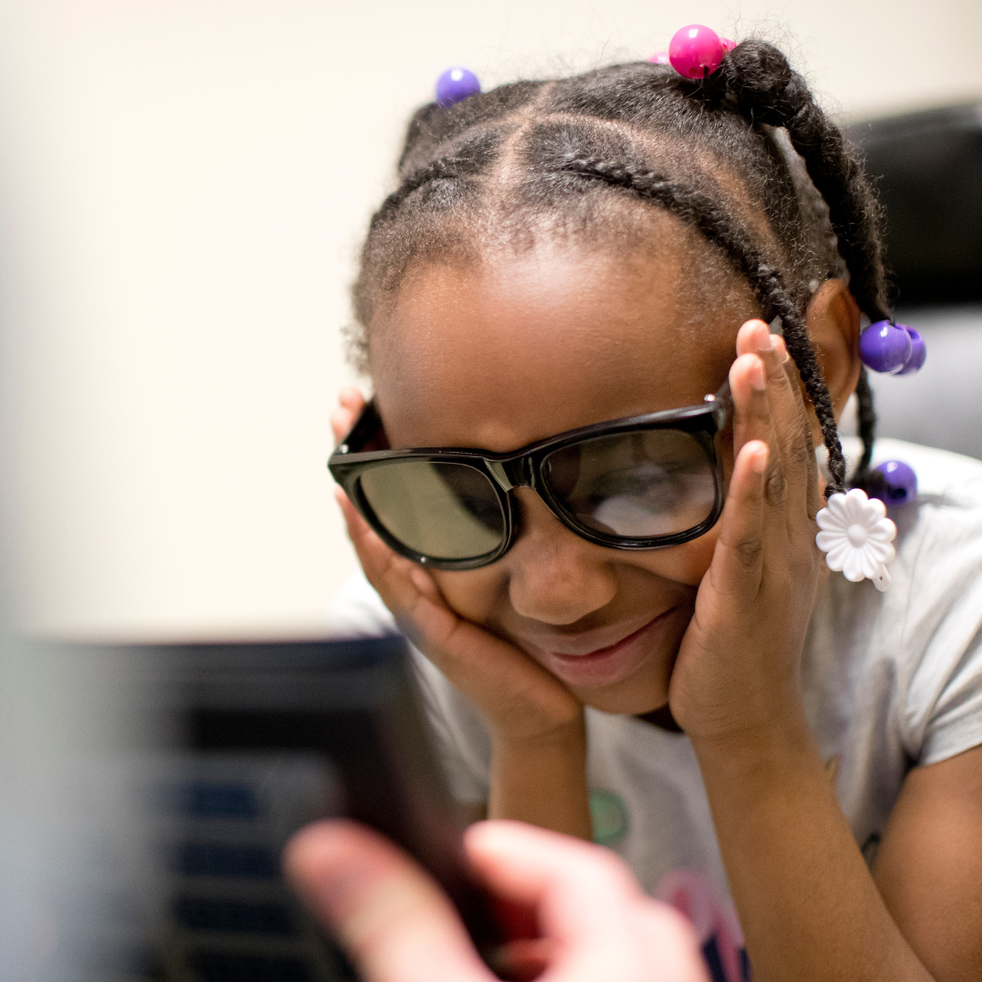 Child wearing sunglasses