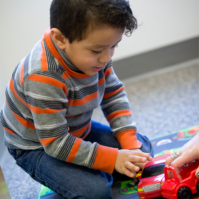 Child playing with toys