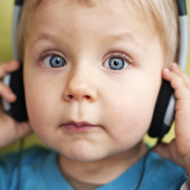 child wearing headphones