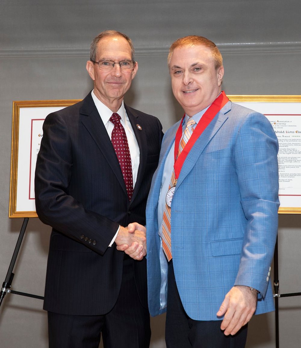 Dr. Pelino wearing his presidential medal with Dr. Mittelman 