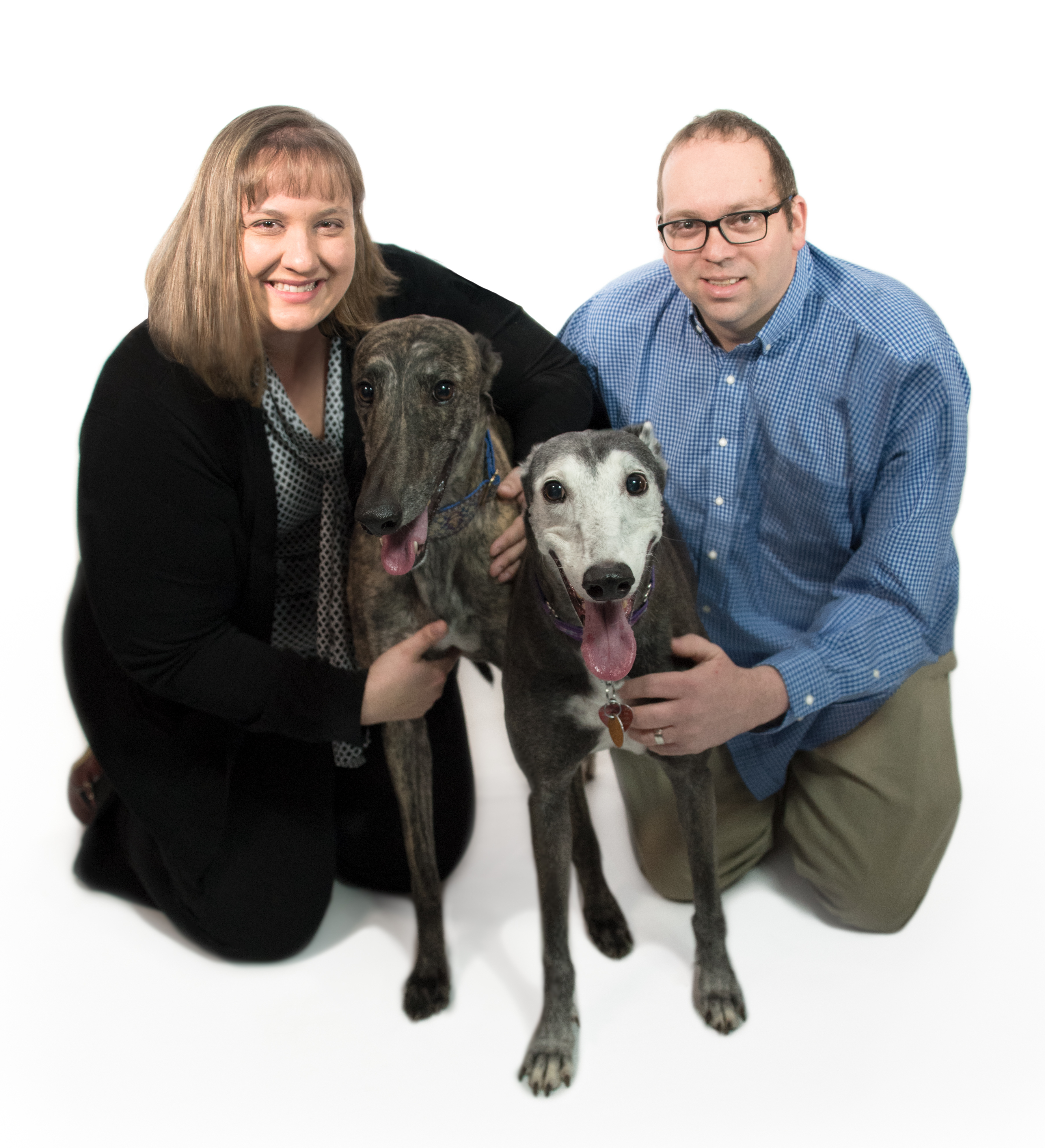 Dr. Jenewein with husband & greyhounds