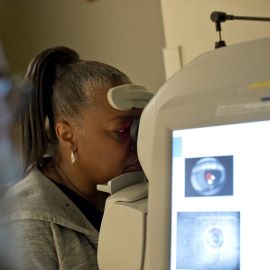 Woman having eye exam