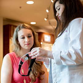 Optometrist and patient