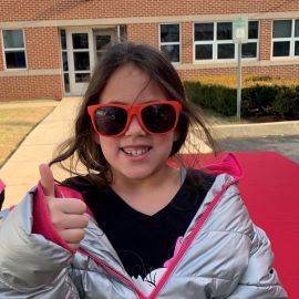 School girl with sunglasses