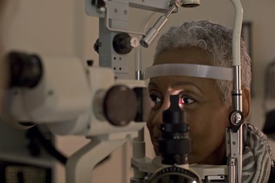 Woman getting an eye exam