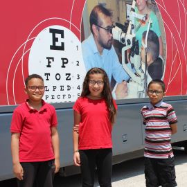 School children in front of the Salus bus