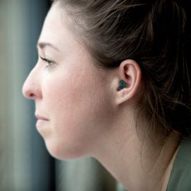 Woman with hearing aid