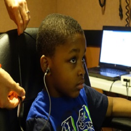 Boy having hearing test