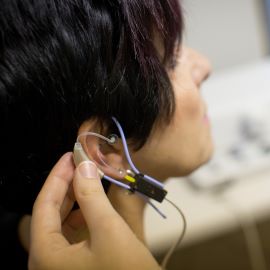 Woman with hearing test