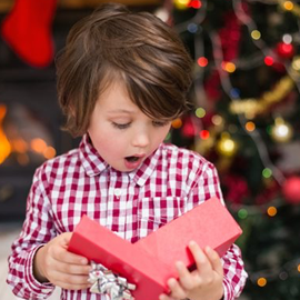 child opening a gift