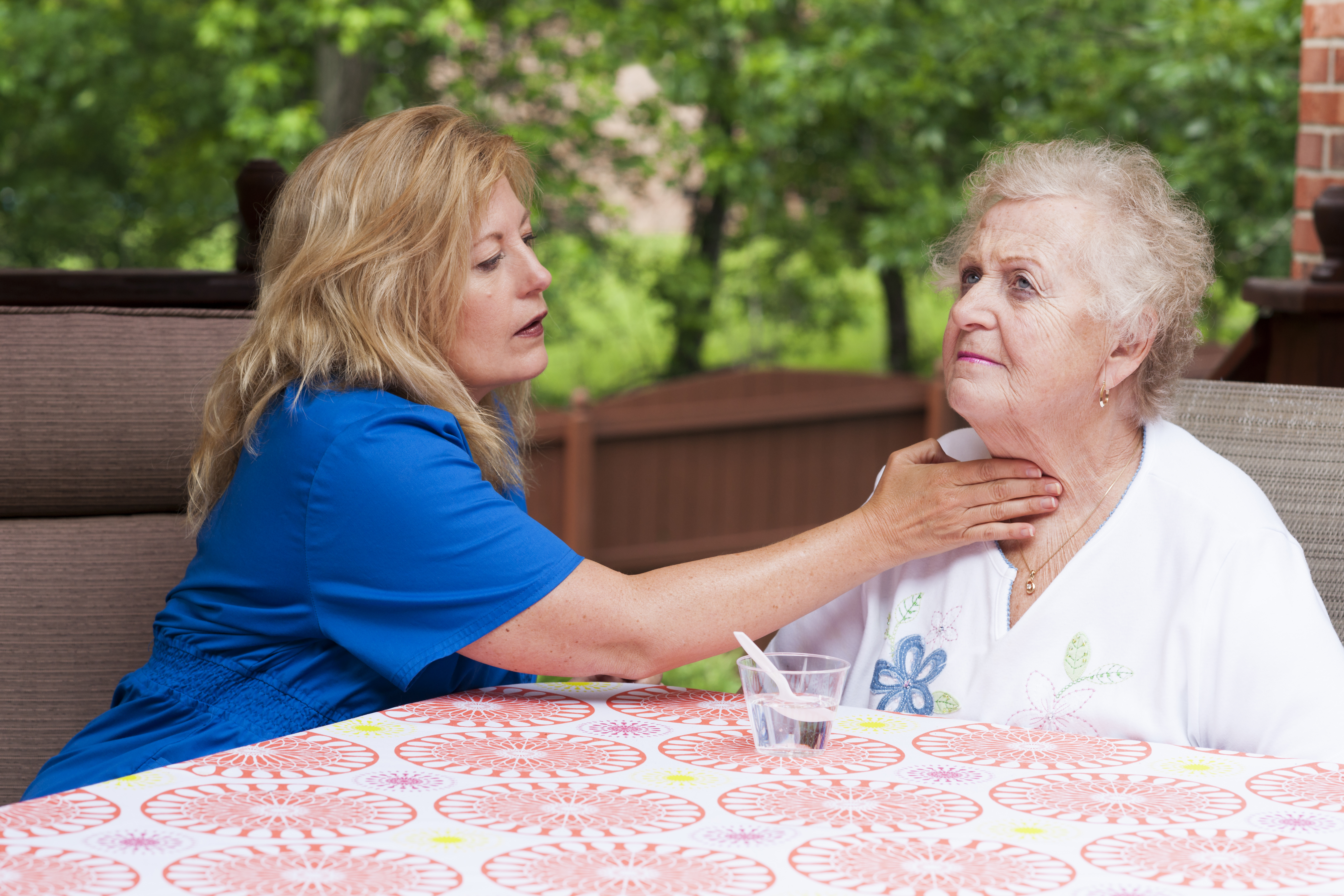 elderly woman and caregiver