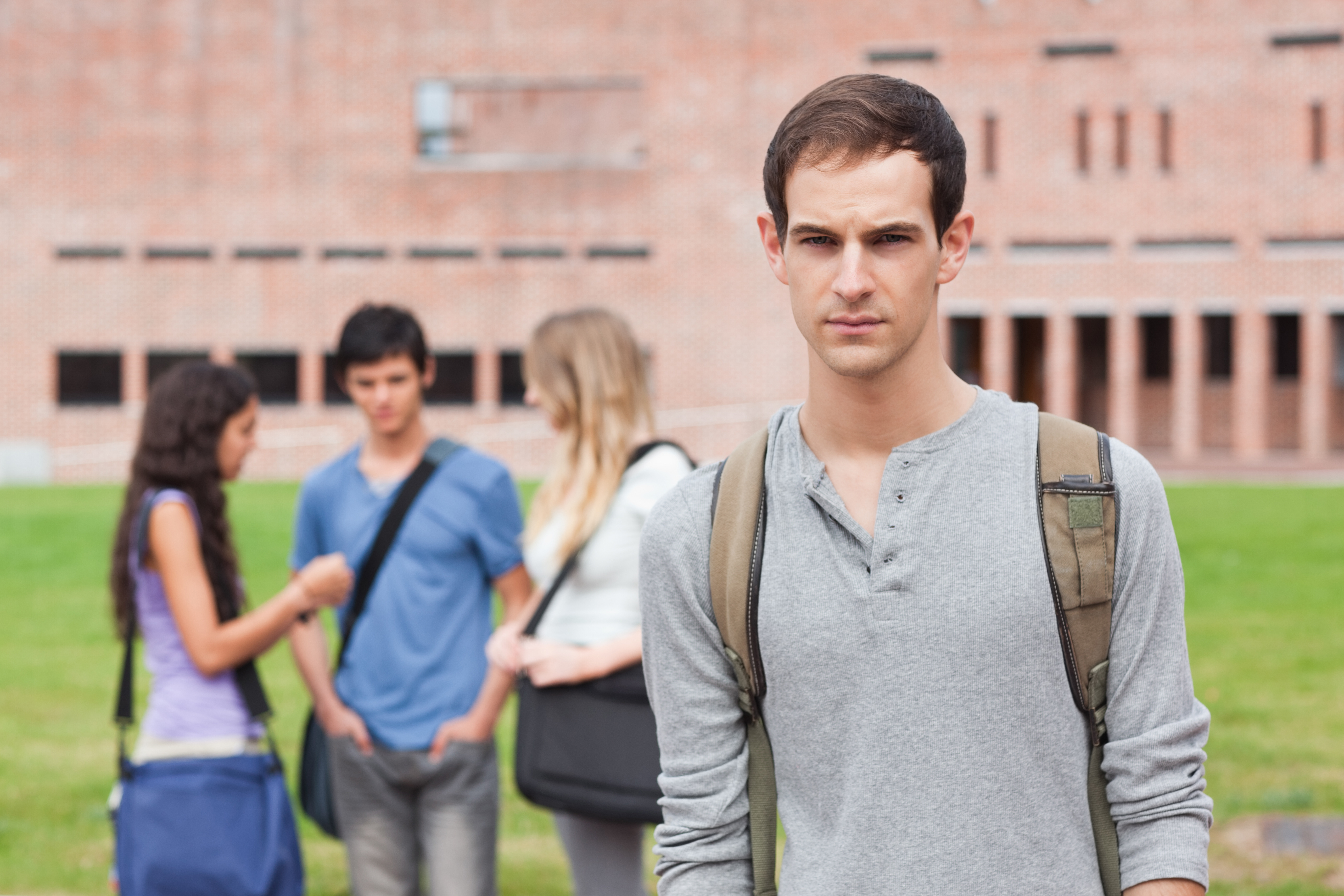 male student standing alone