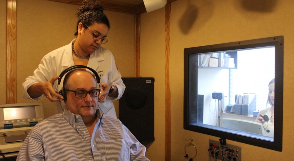 older man having hearing test