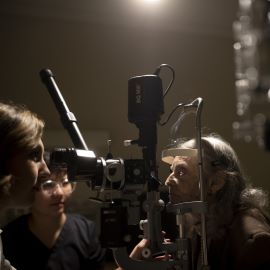 Older woman having eye exam