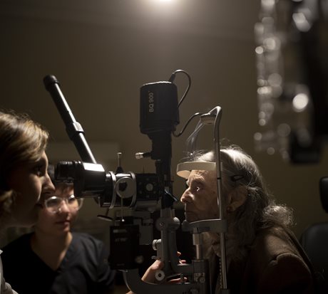 Older woman having eye exam