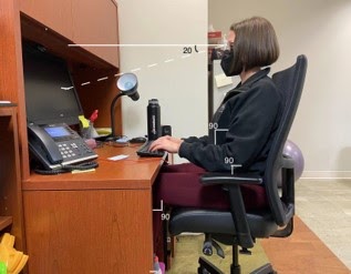 woman sitting in computer chair