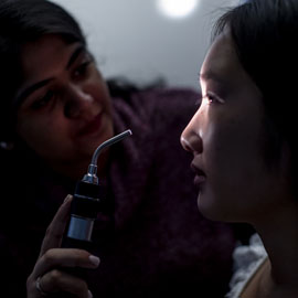 Woman having eye exam