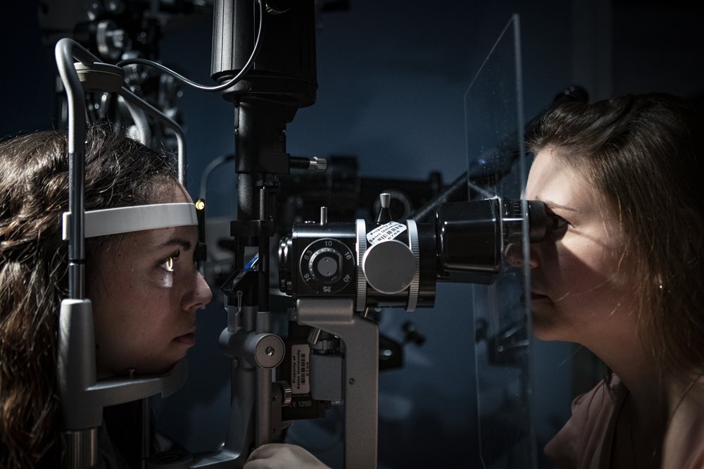 Woman having eye exam