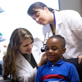 boy having audiology exam