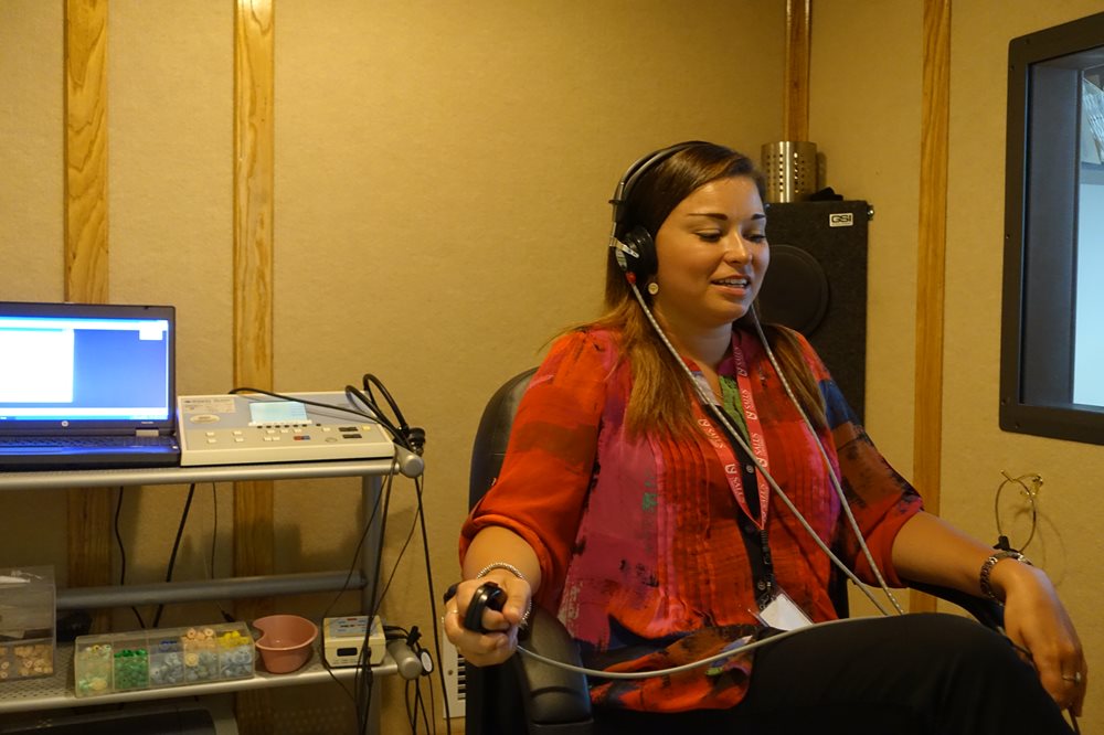 Woman having hearing test