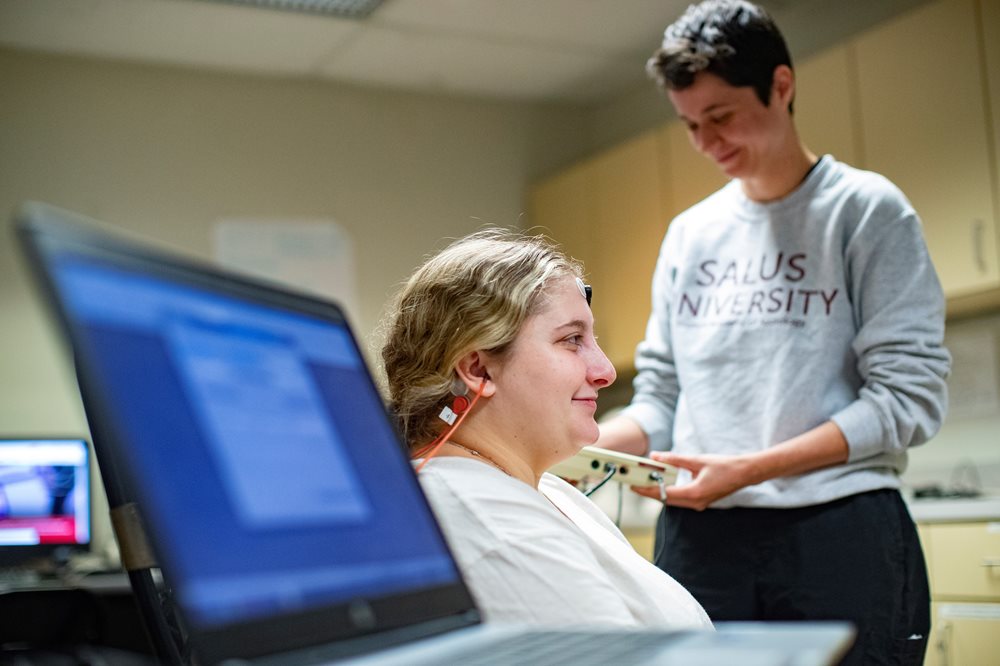 Student conducts hearing exam