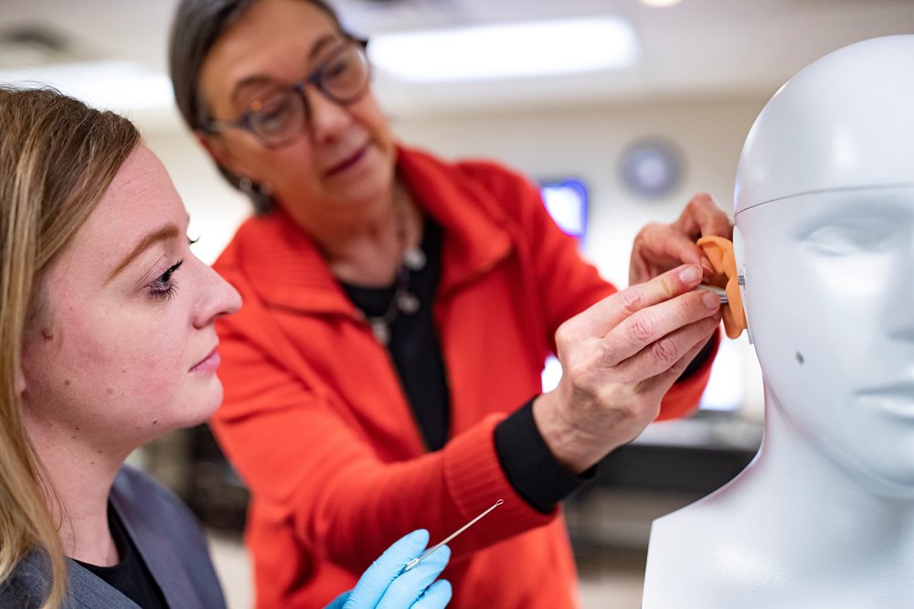 Dr. Jonette Owen working with a student