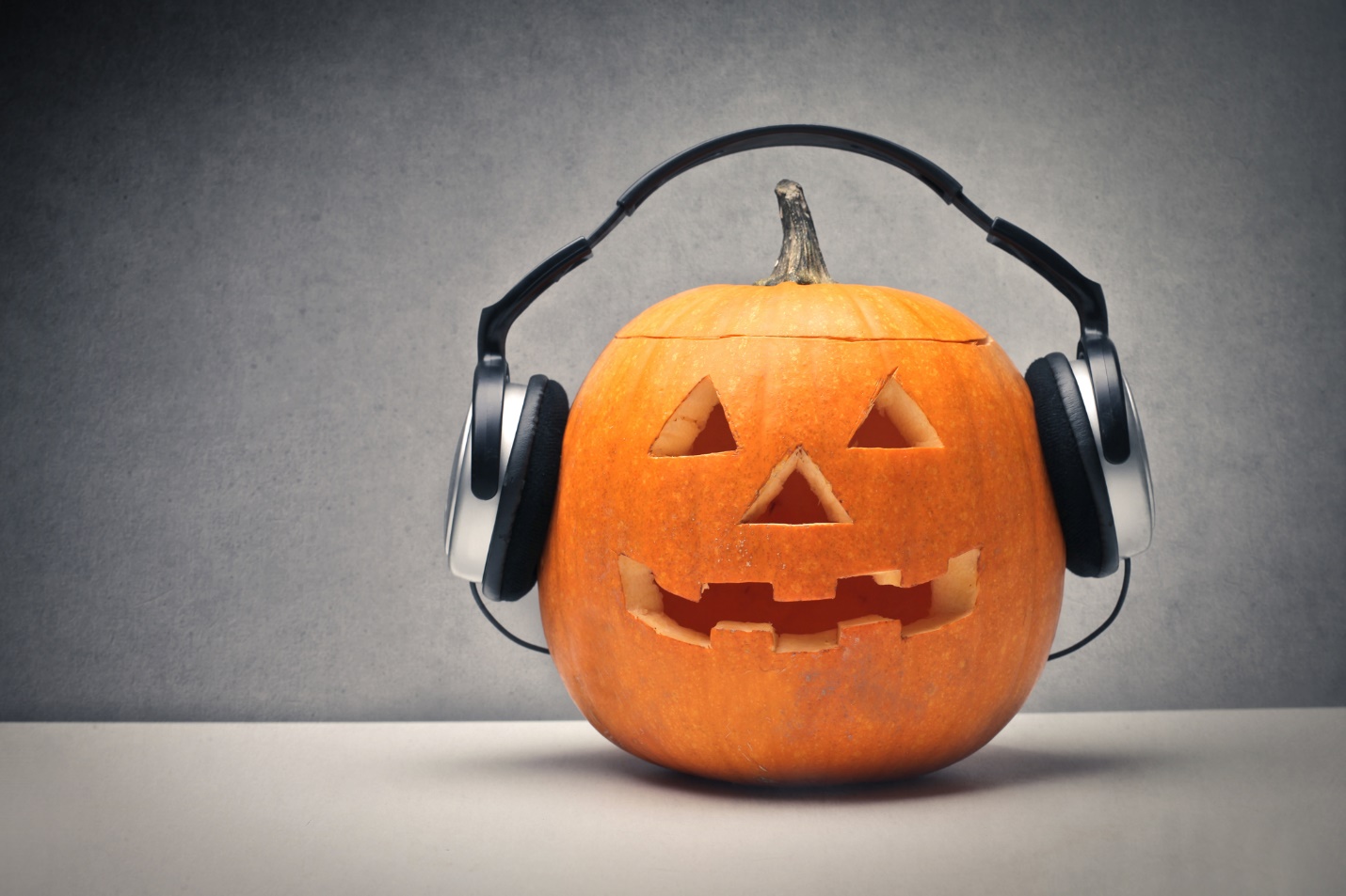 Pumpkin wearing headphones