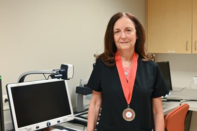 Dr. Appel wearing her presidential medal