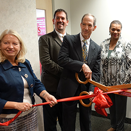 Ribbon cutting at SLI's opening