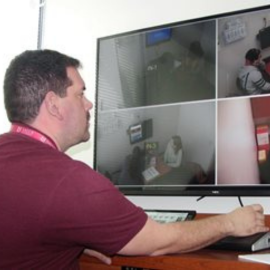 Bob Serianni sitting at a computer