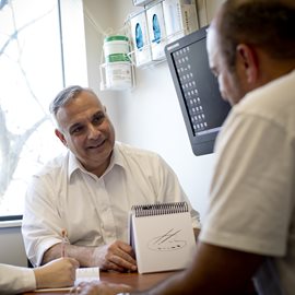 Clinician working with patient