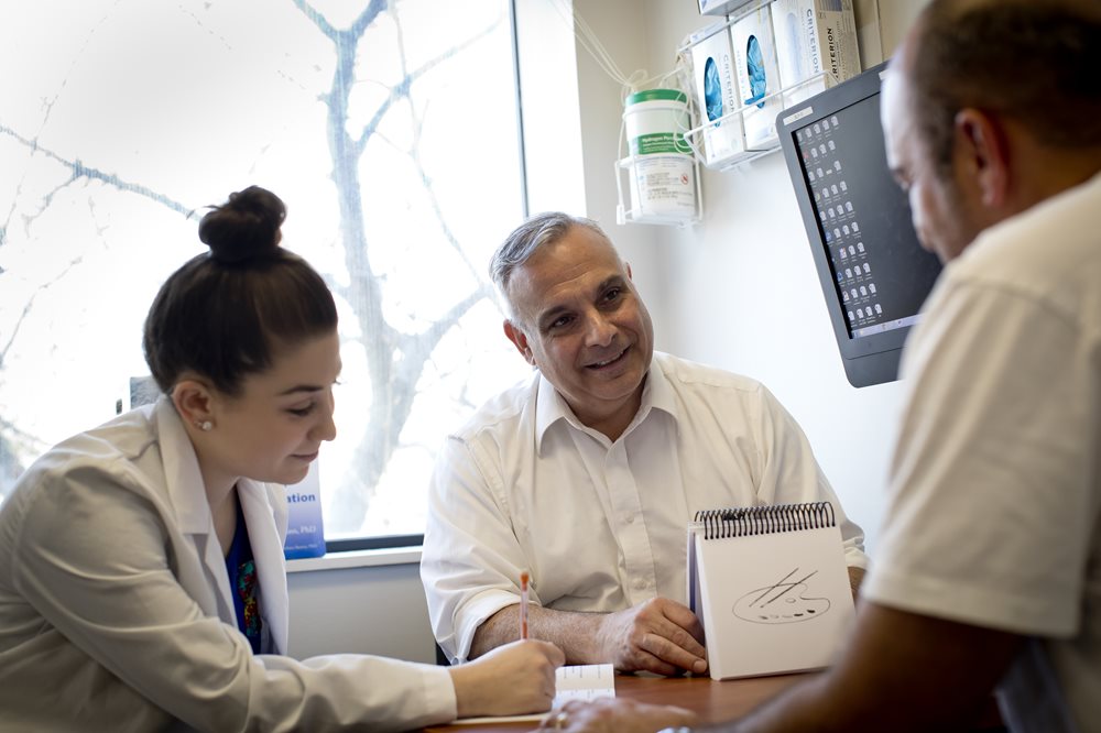 Speech language pathologist and patient