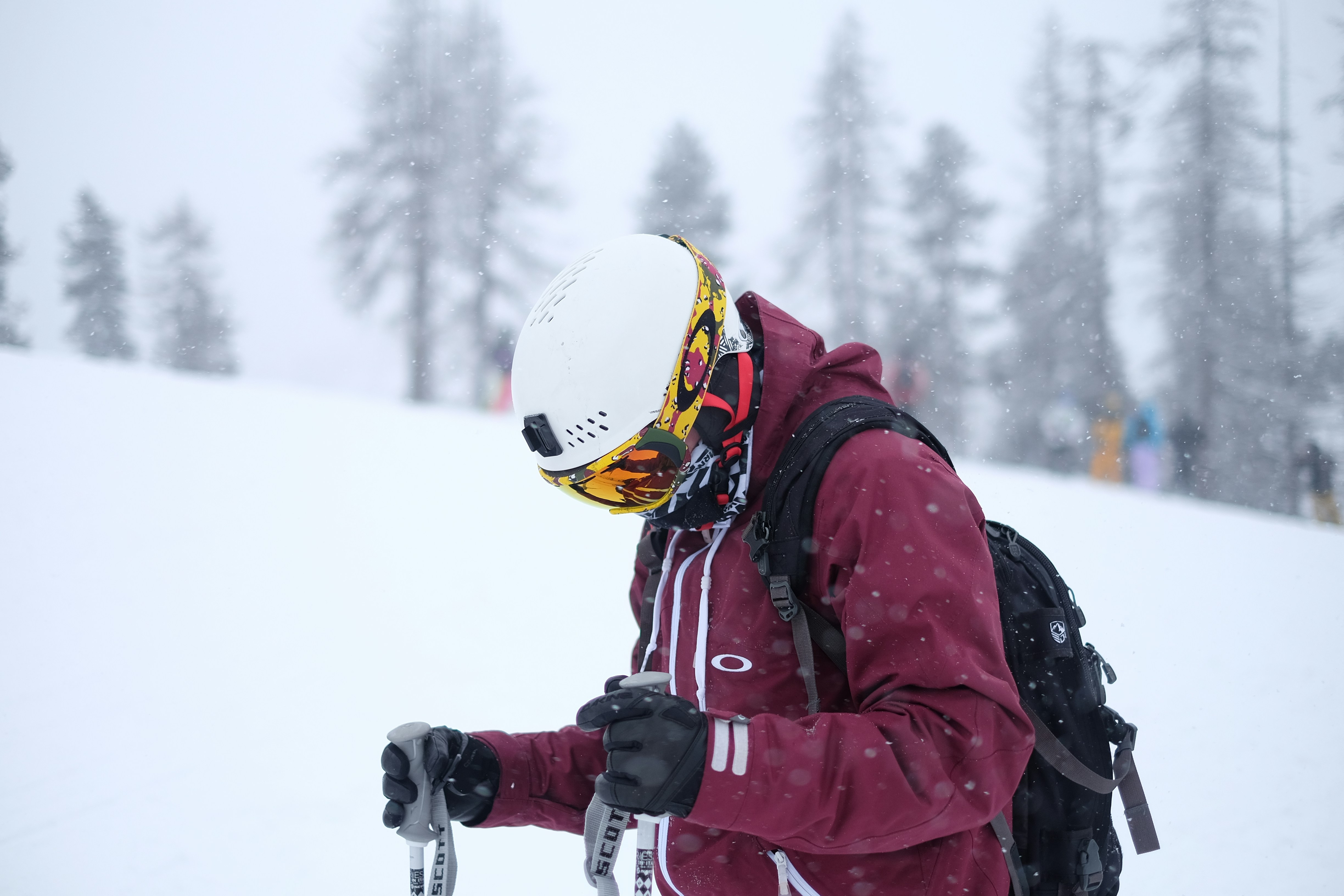 man wearing snow gear, helmet, and goggles