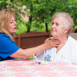 elderly woman and caregiver